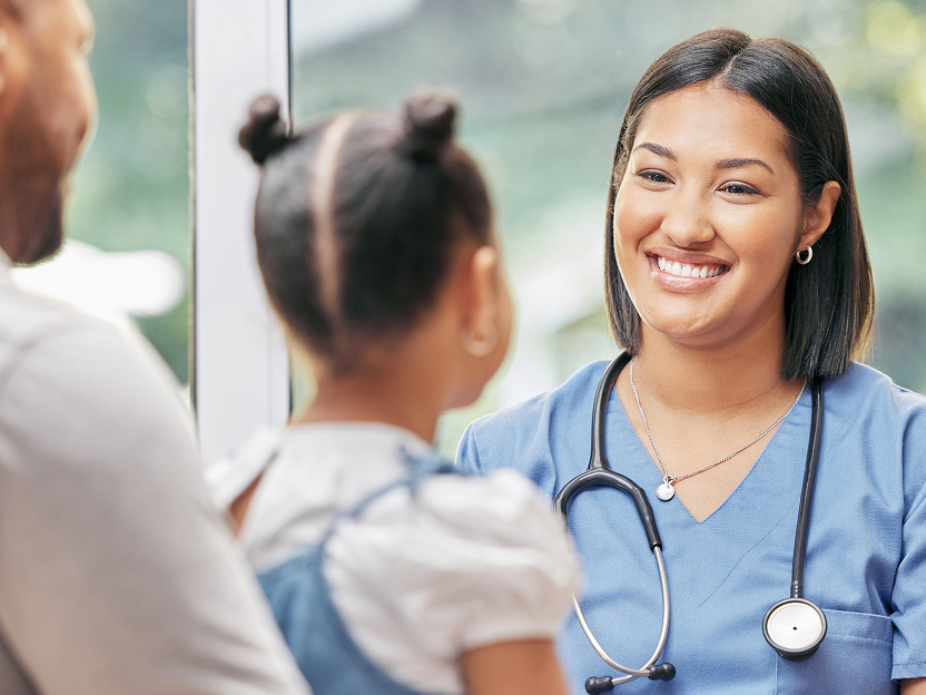 nurse-smiling-at-a-kid