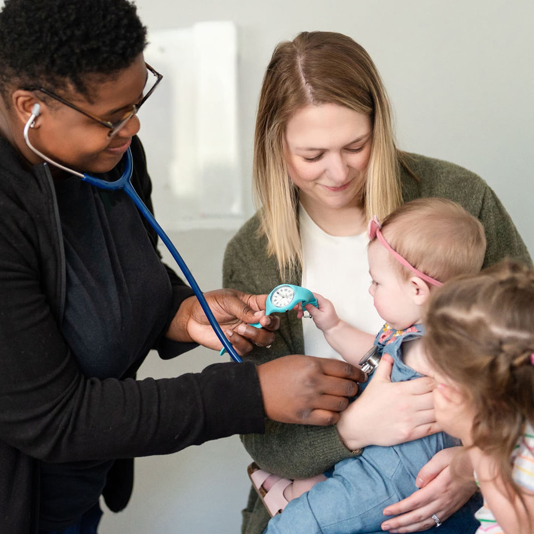 Care provider with mother and child